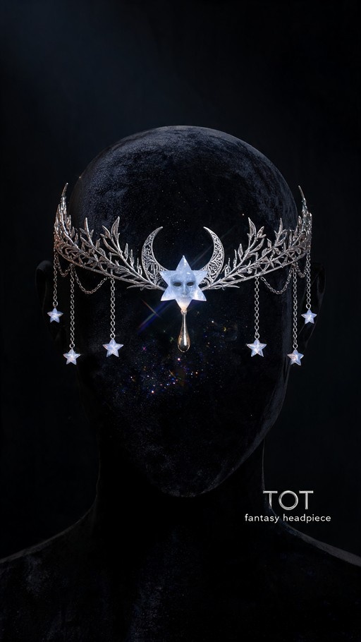 Silver fantasy crown with a star mask and moon accents on a black mannequin head