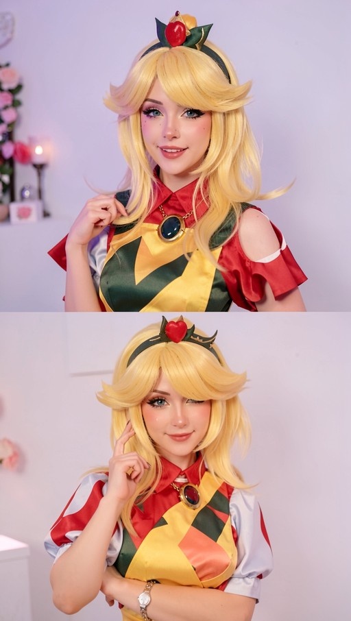 A blonde woman in a yellow and green diamond-patterned dress with an apple headpiece smiles and winks at the camera.