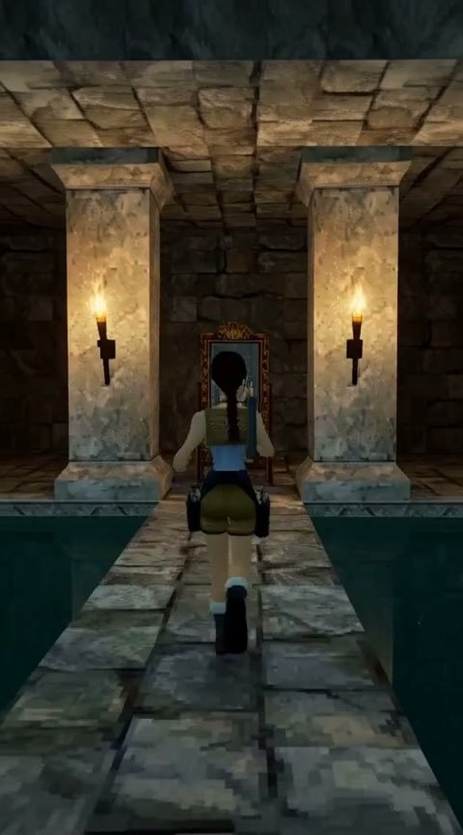 A 3D animated video of Lara Croft walking down a stone corridor towards an ornate mirror and looking at her reflection.